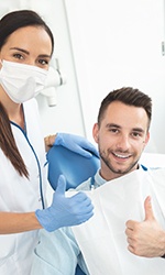 Patient in Studio City seeing their dentist for dental implants