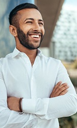 Patient in Studio City smiling with friends after a root canal treatment